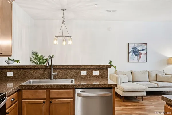 $428,000 | 7140 Simms Street, Unit 102, Arvada, CO 80004