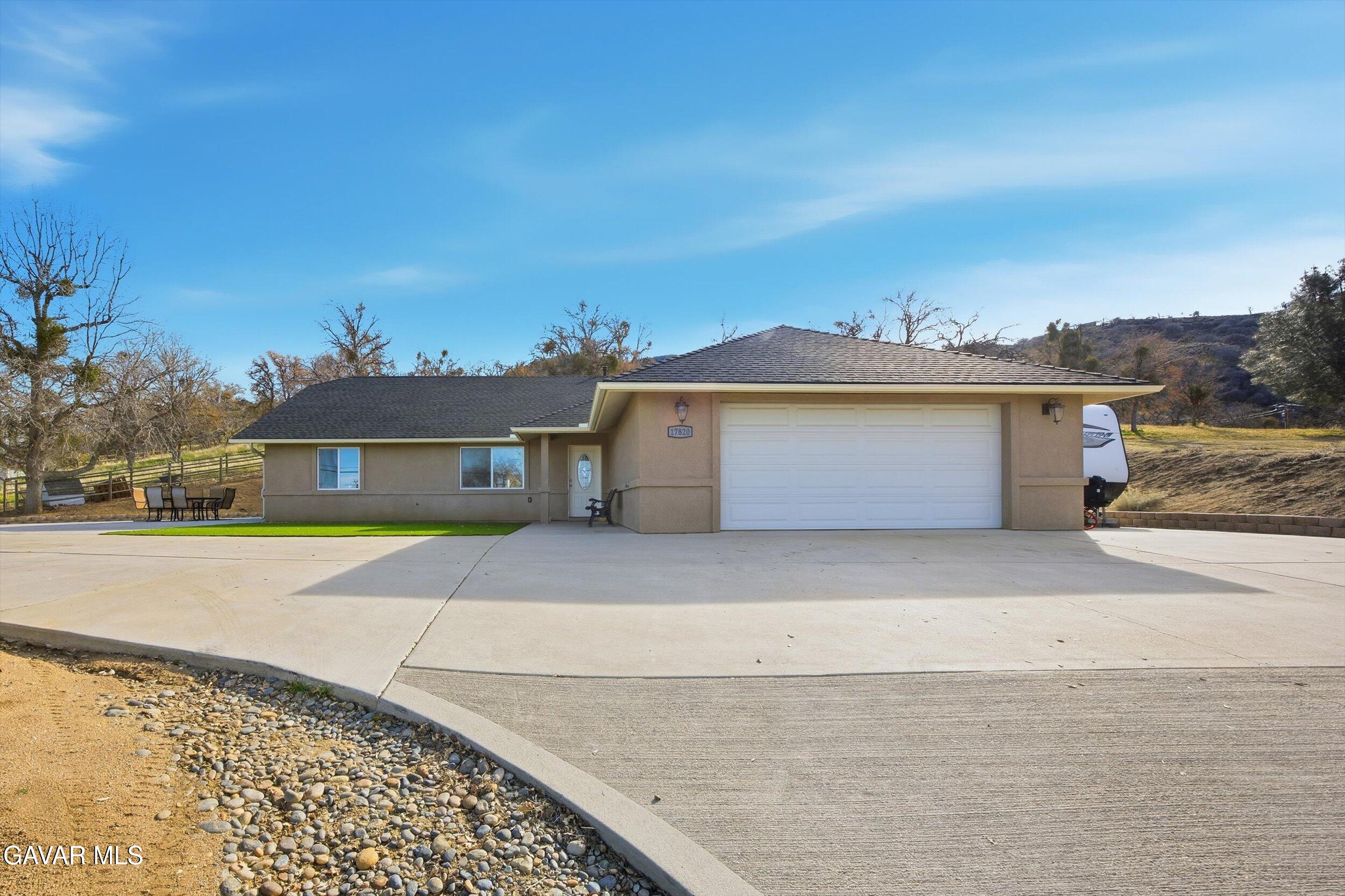 17820 Bold Venture Drive Tehachapi, CA 93561 - Photo 2 of 50 front view of a house with a road