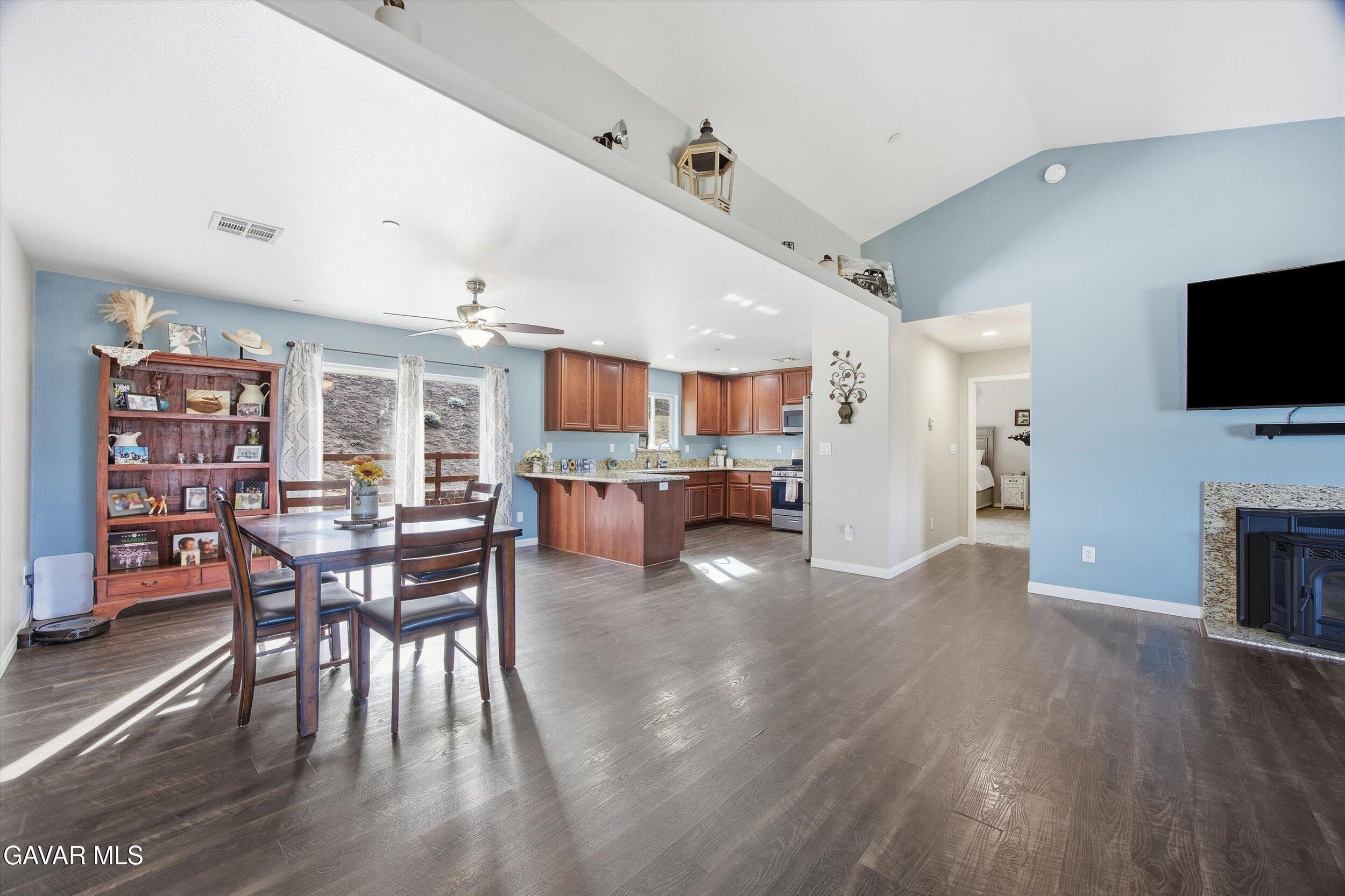 17820 Bold Venture Drive Tehachapi, CA 93561 - Photo 23 of 50 a view of a livingroom with furniture and a flat screen tv