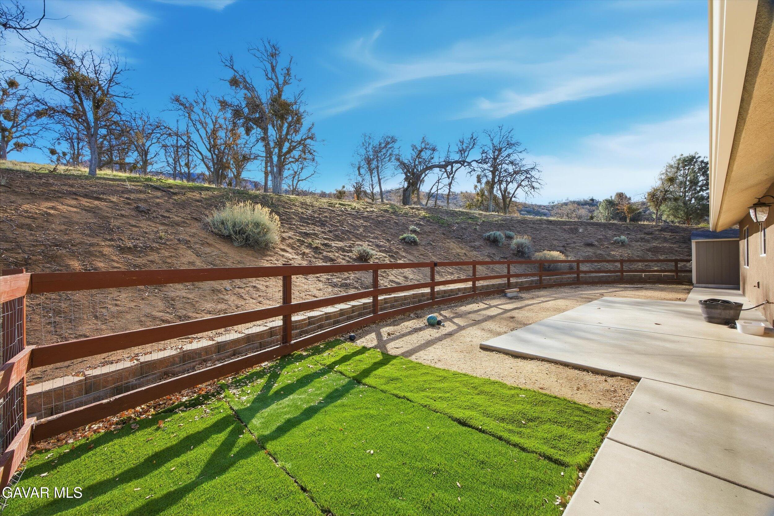 17820 Bold Venture Drive Tehachapi, CA 93561 - Photo 45 of 50 a view of a backyard with a road