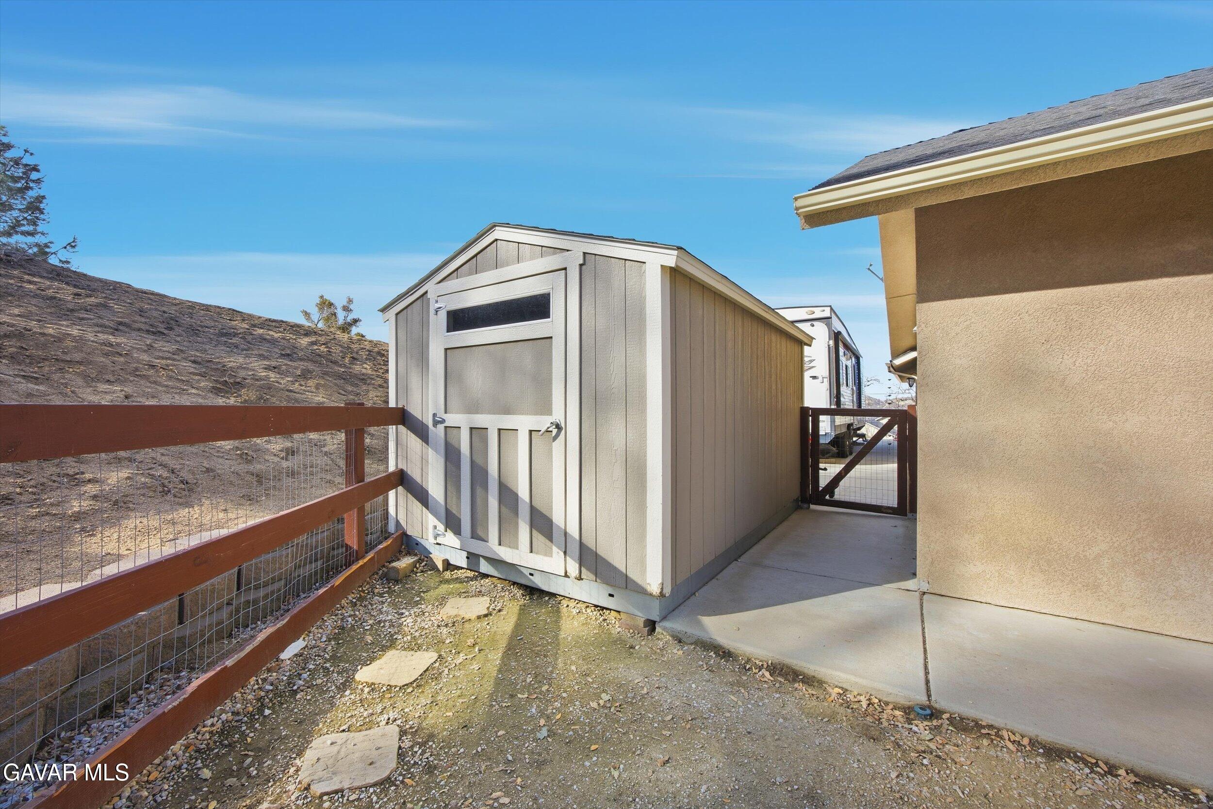 17820 Bold Venture Drive Tehachapi, CA 93561 - Photo 47 of 50 a view of a balcony with floor to ceiling windows