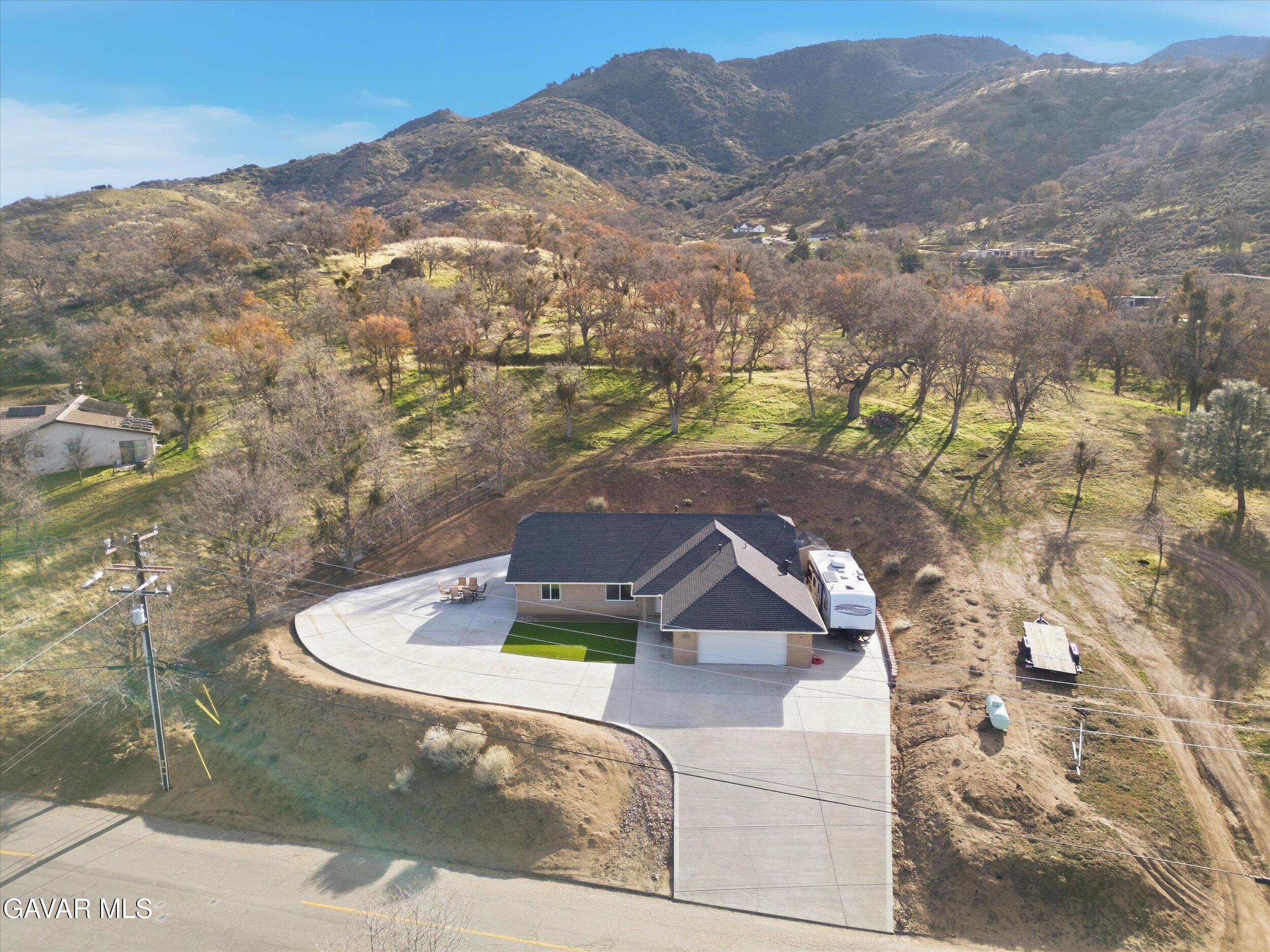 17820 Bold Venture Drive Tehachapi, CA 93561 - Photo 9 of 50 a view of a house with a yard