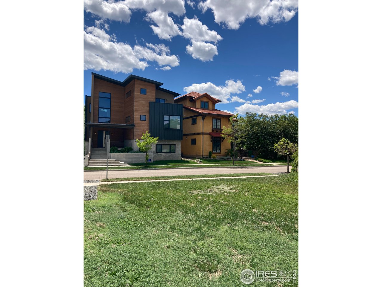 a view of a house with a sink and a yard