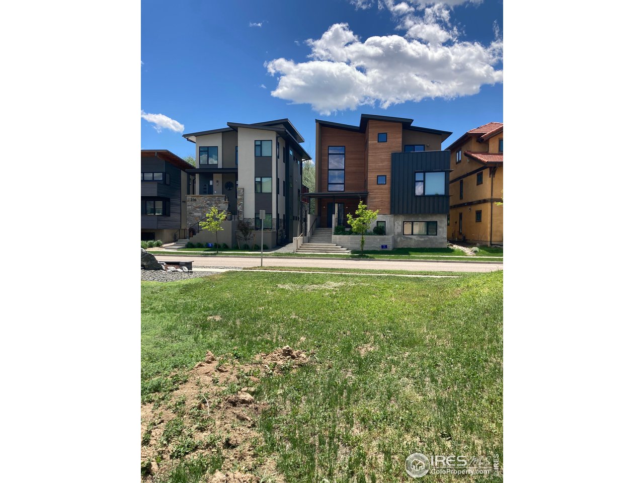 232 Pascal Street Fort Collins, CO 80524 - Photo 2 of 13 a view of a house with a yard