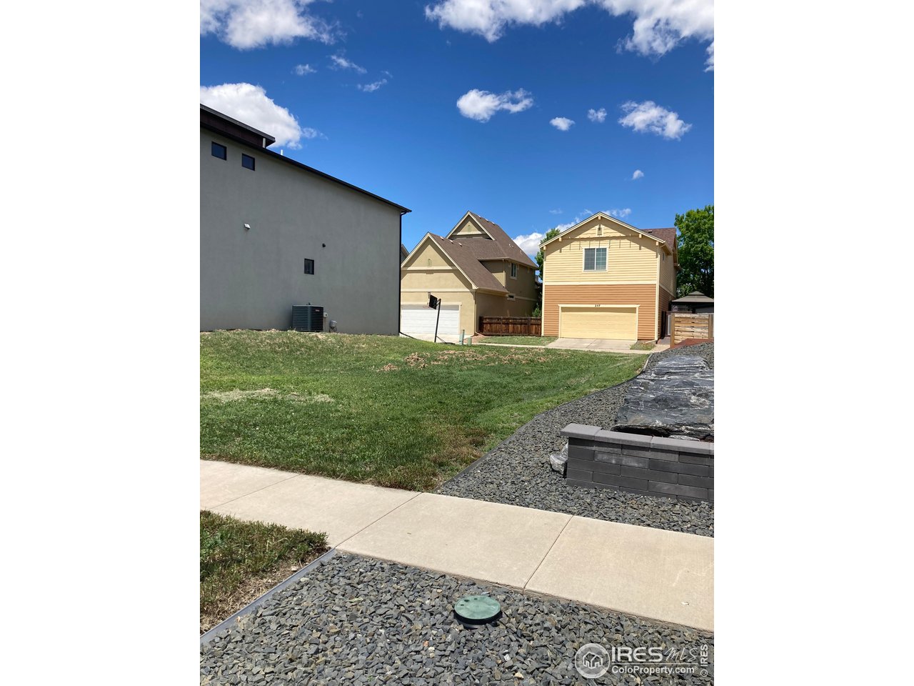 232 Pascal Street Fort Collins, CO 80524 - Photo 5 of 13 a view of a back yard of the house