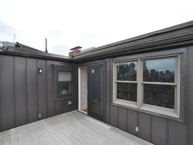 a view of a balcony with city view