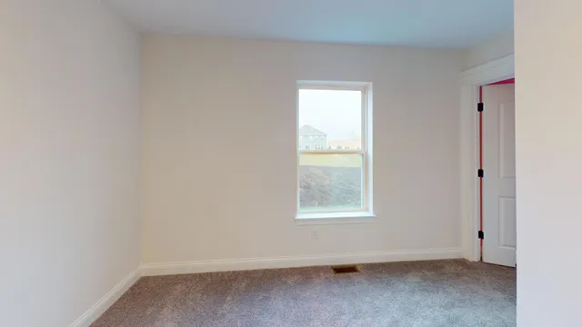 an empty room with a window