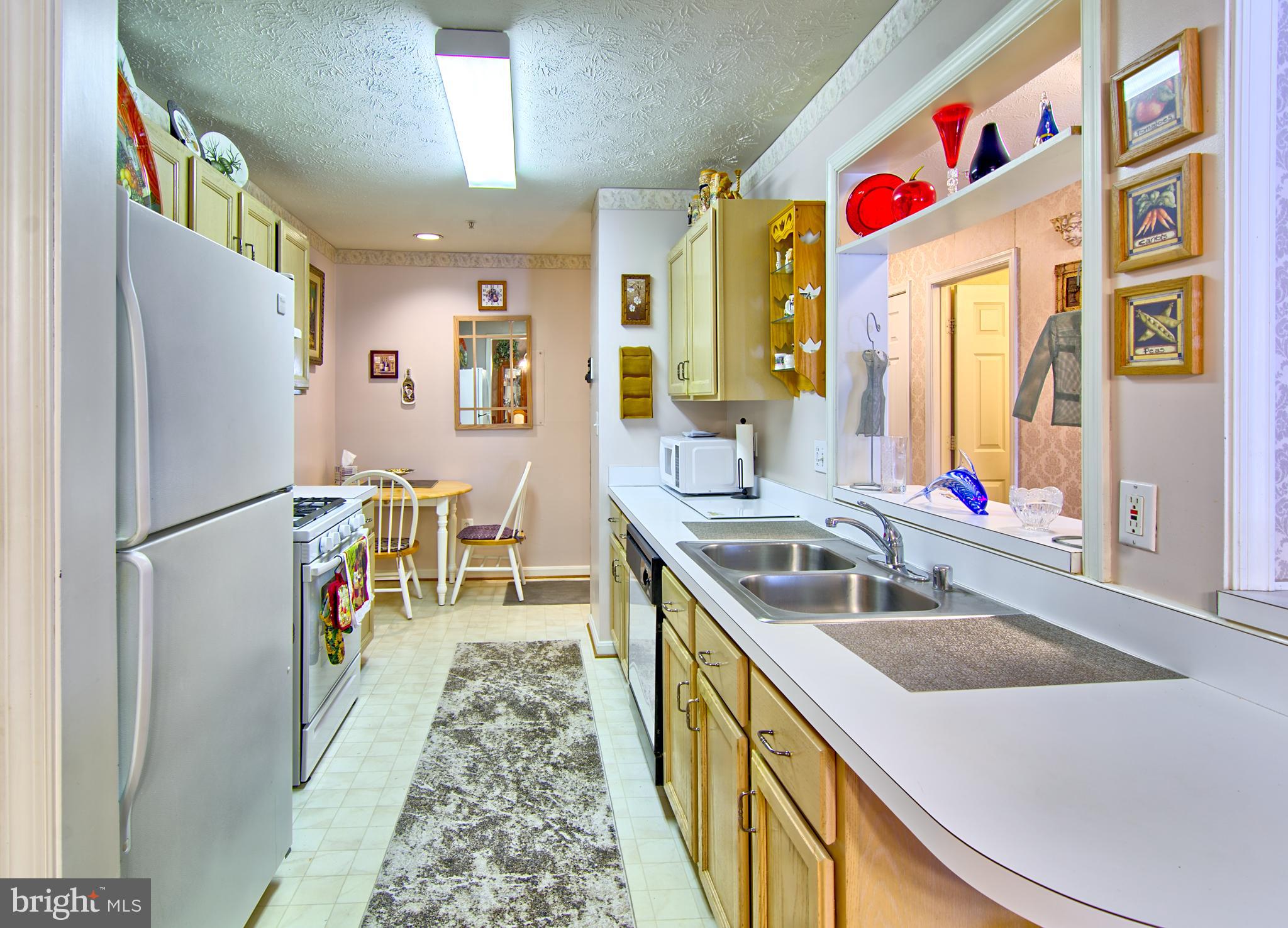 826 Kennington Road Reisterstown, MD 21136 - Photo 13 of 29 Kitchen w/ Table Space Open to Dining Room