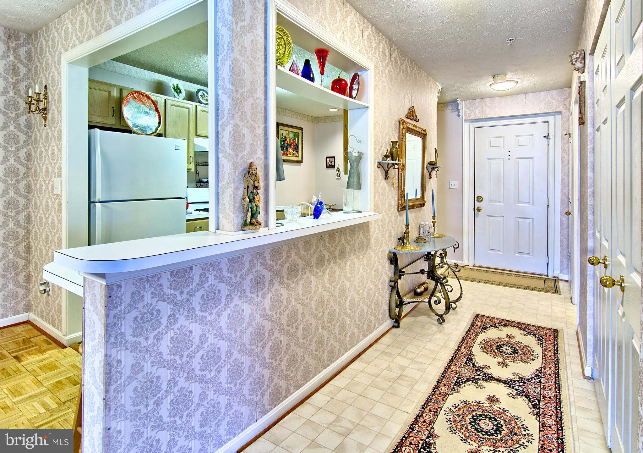 826 Kennington Road Reisterstown, MD 21136 - Photo 4 of 29 Long Foyer Open to Kitchen and Dining