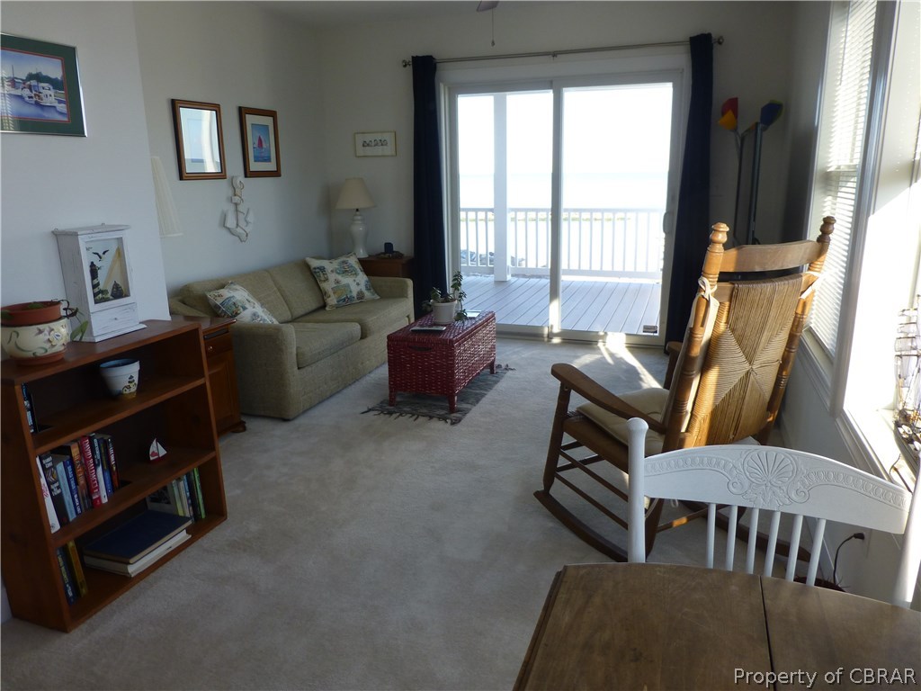 8 Chesapeake Shore Road Port Haywood, VA 23138 - Photo 14 of 26 Den area on second level - opens to private deck. Sleeper sofa for extra company.