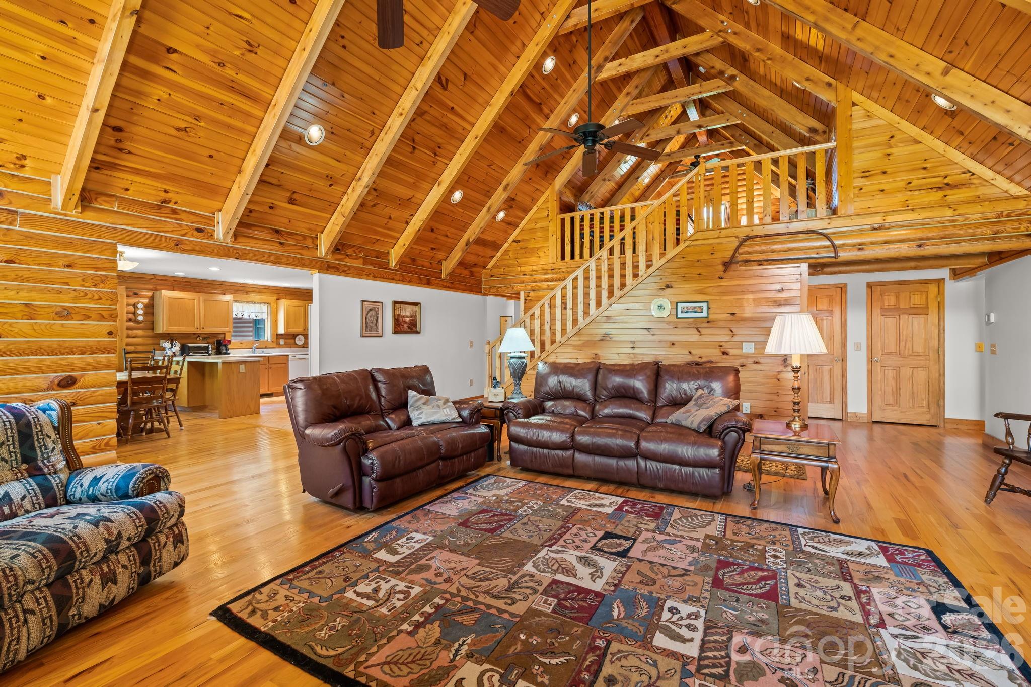 3341 Peniel Road Tryon, NC 28782 - Photo 12 of 48 a living room with furniture and a rug