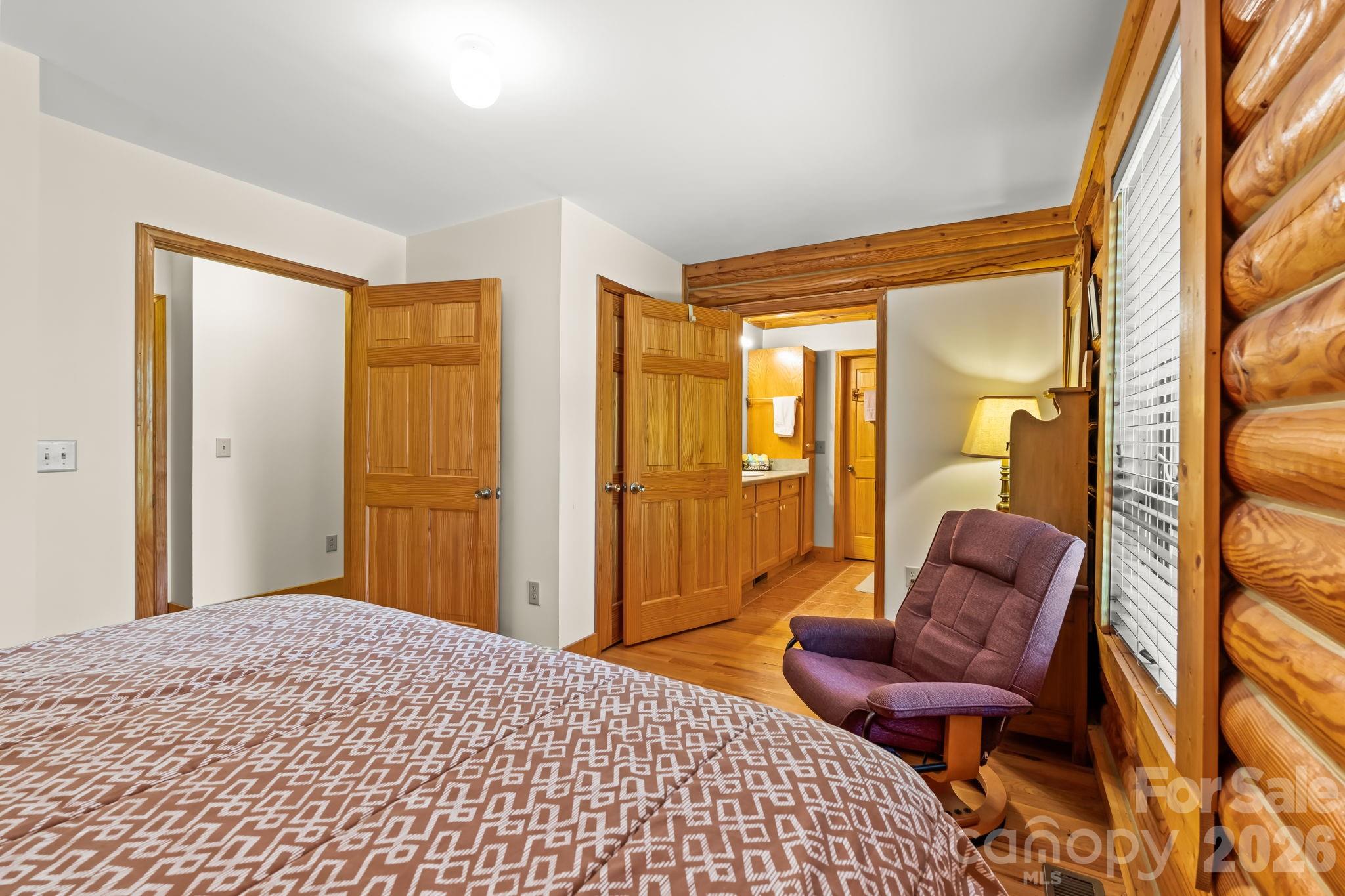 3341 Peniel Road Tryon, NC 28782 - Photo 26 of 48 a bedroom with furniture and a window