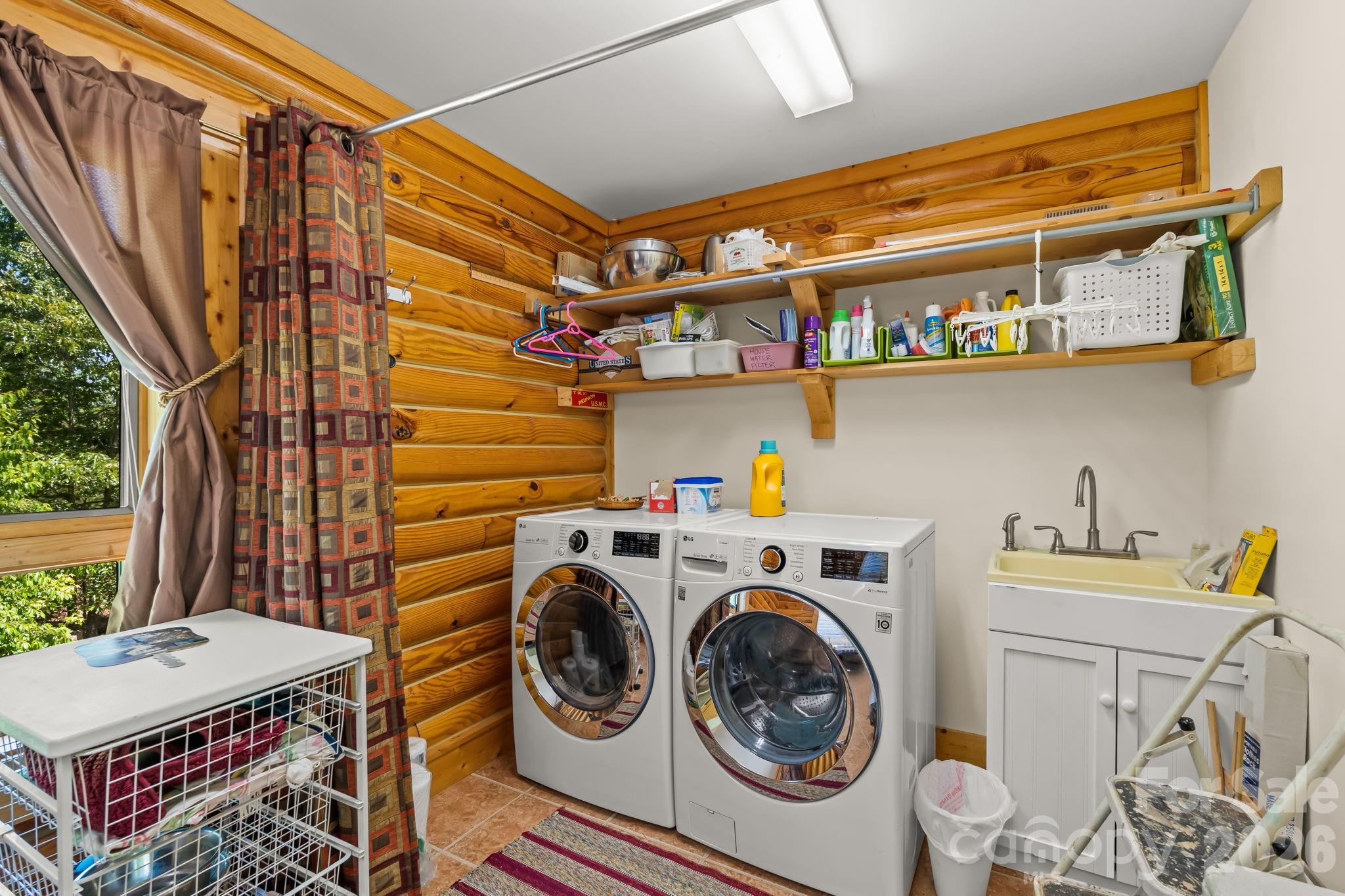 3341 Peniel Road Tryon, NC 28782 - Photo 31 of 48 a utility room with dryer and washer