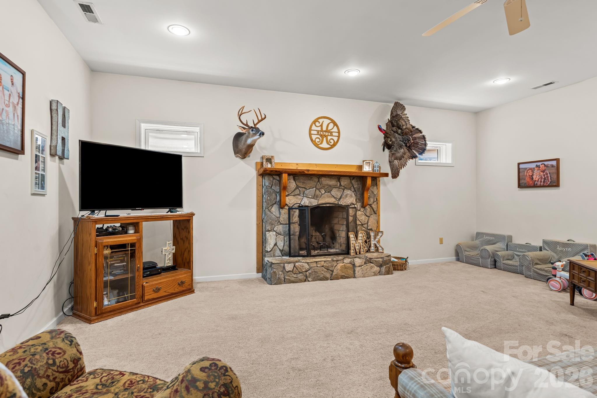3341 Peniel Road Tryon, NC 28782 - Photo 33 of 48 a living room with furniture and a flat screen tv
