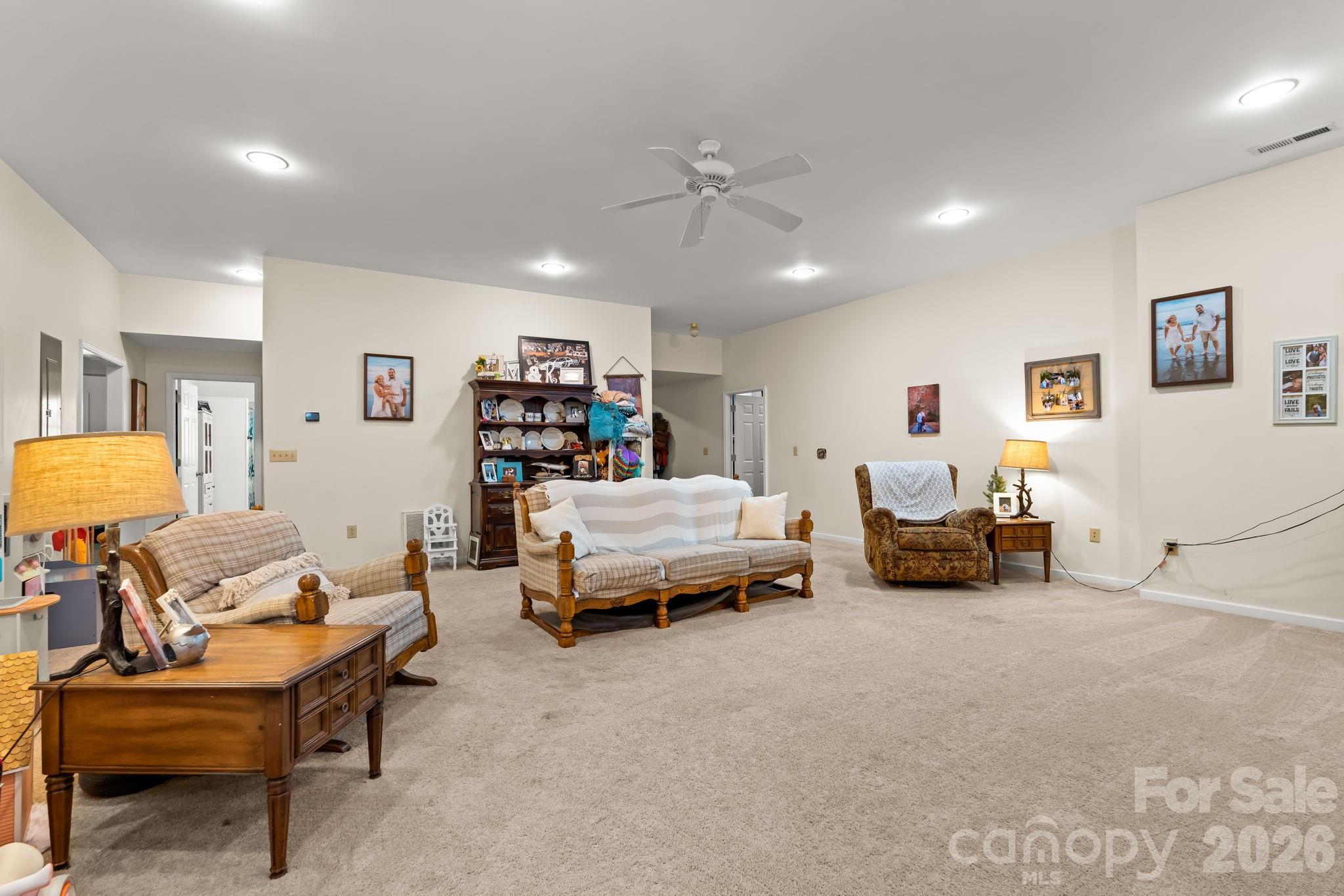 3341 Peniel Road Tryon, NC 28782 - Photo 34 of 48 a bedroom with furniture and a lamp