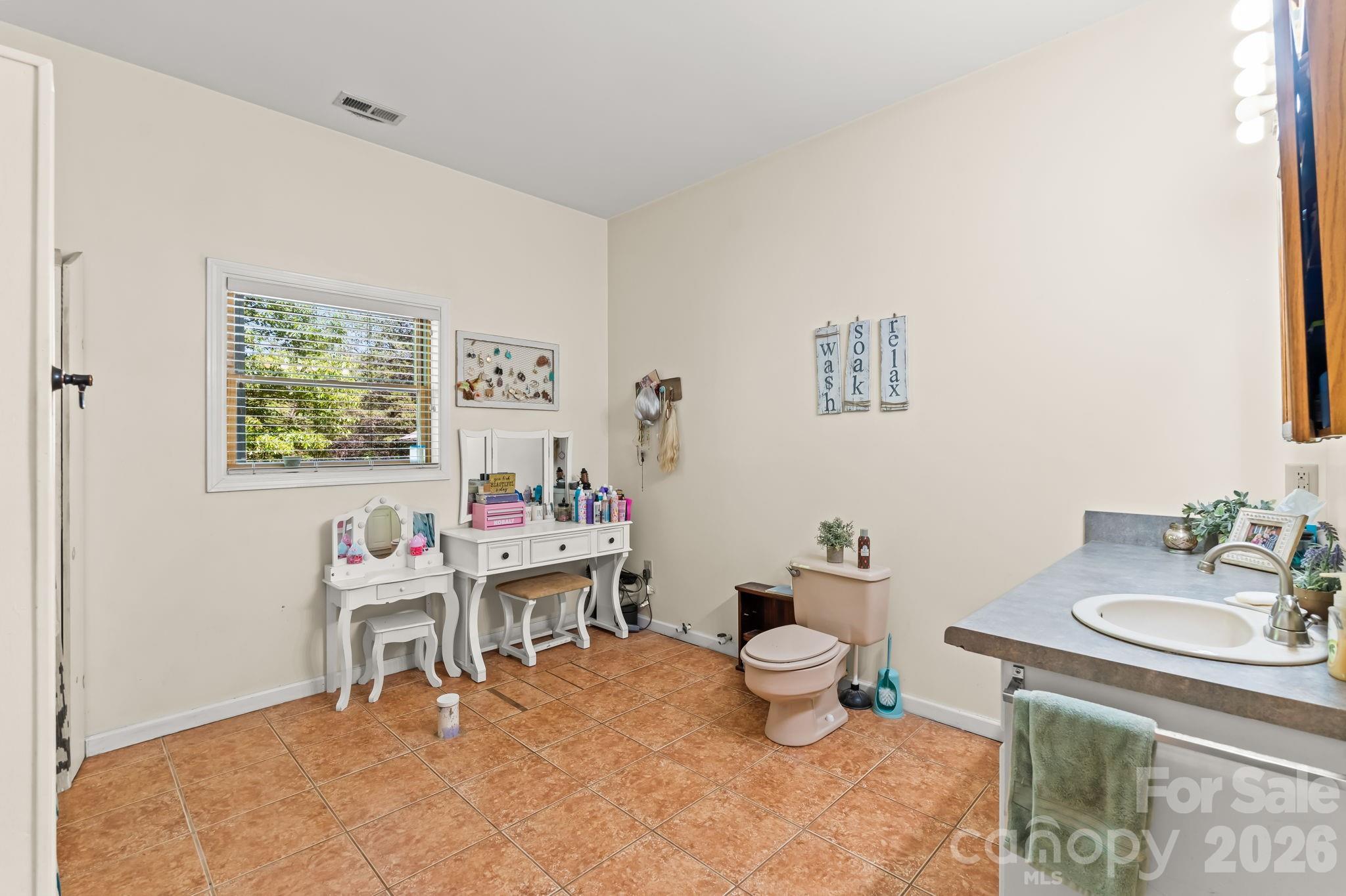 3341 Peniel Road Tryon, NC 28782 - Photo 41 of 48 a living room with furniture a window and a table