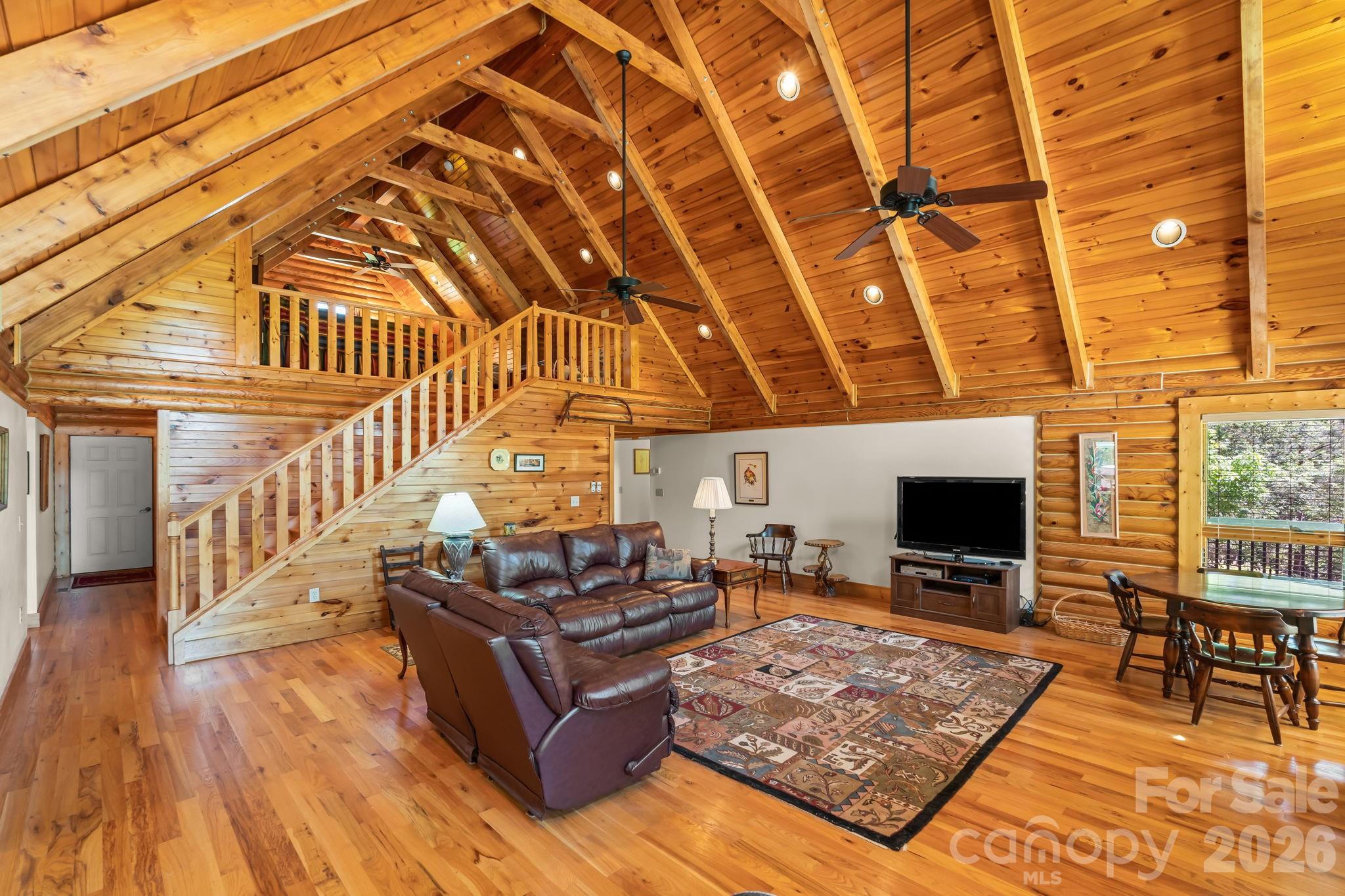 3341 Peniel Road Tryon, NC 28782 - Photo 8 of 48 a living room with furniture and a flat screen tv
