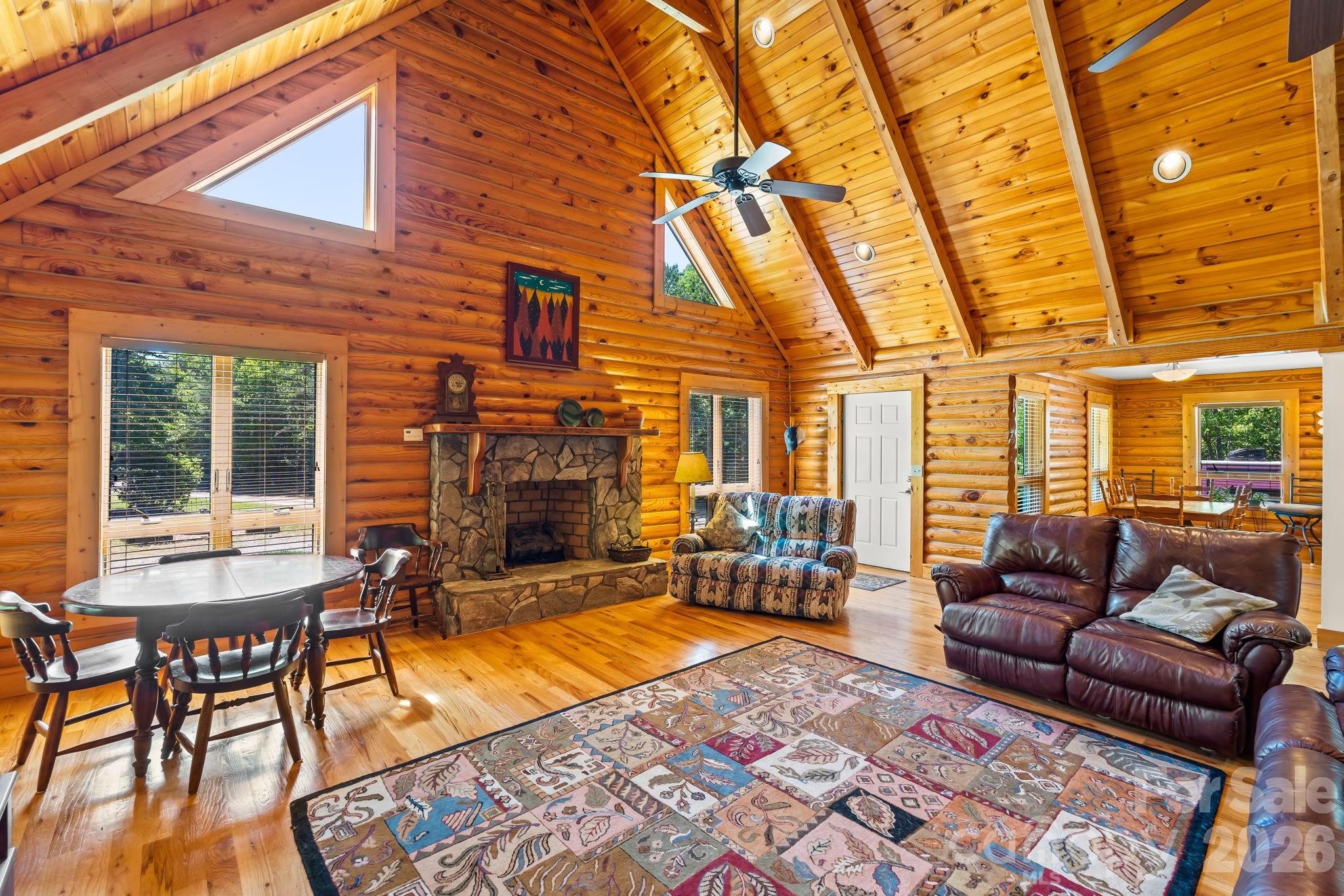3341 Peniel Road Tryon, NC 28782 - Photo 10 of 48 a living room with furniture and a fireplace