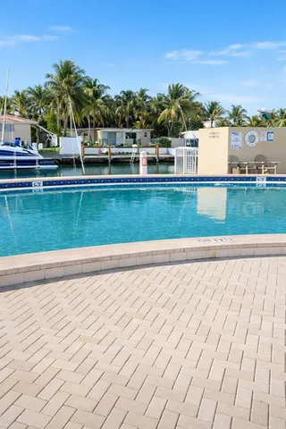 an aerial view of a house with a lake view