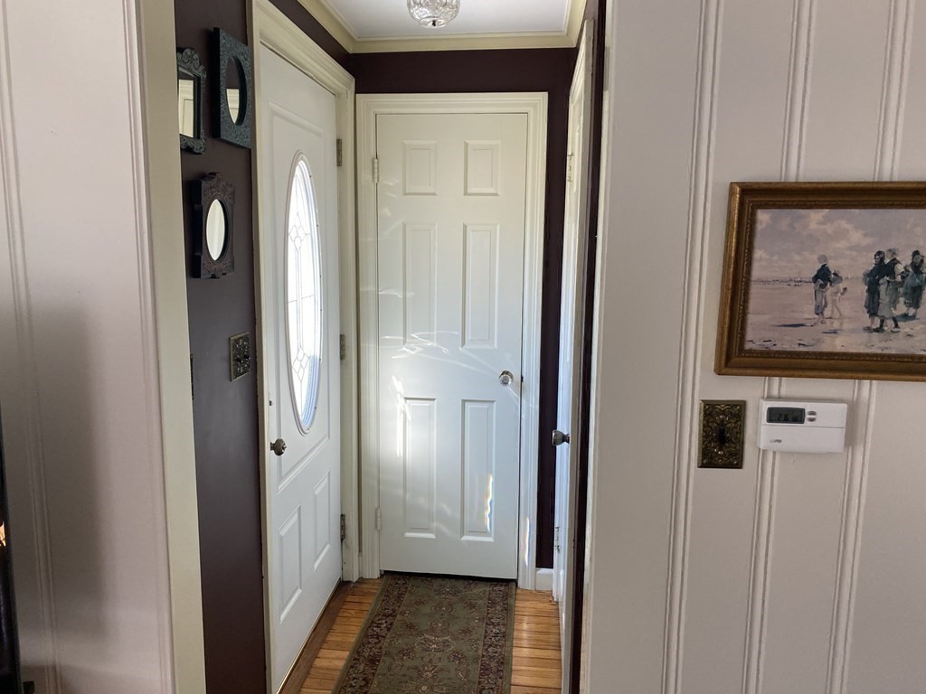 37 Pilgrim Road Springfield, MA 01118 - Photo 25 of 28 a view of a hallway with wooden floor