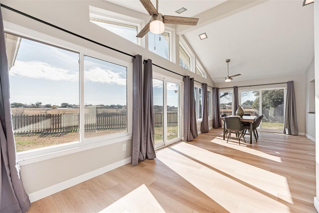 1954 Rambling Ridge Lane Carrollton, TX 75007 - Photo 6 of 23 a living room with furniture and a large window