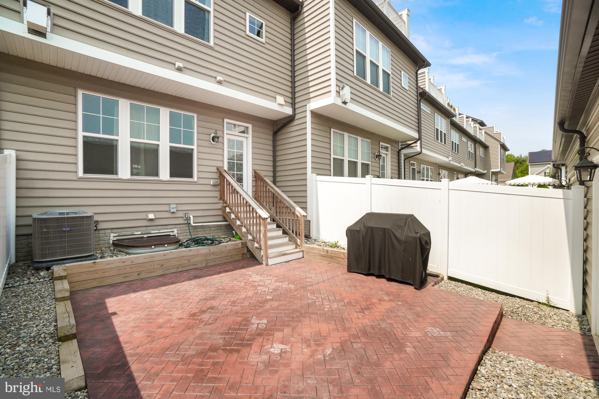 513 Prieur Road Frederick, MD 21701 - Photo 34 of 47 Brick Patio leading to Garage