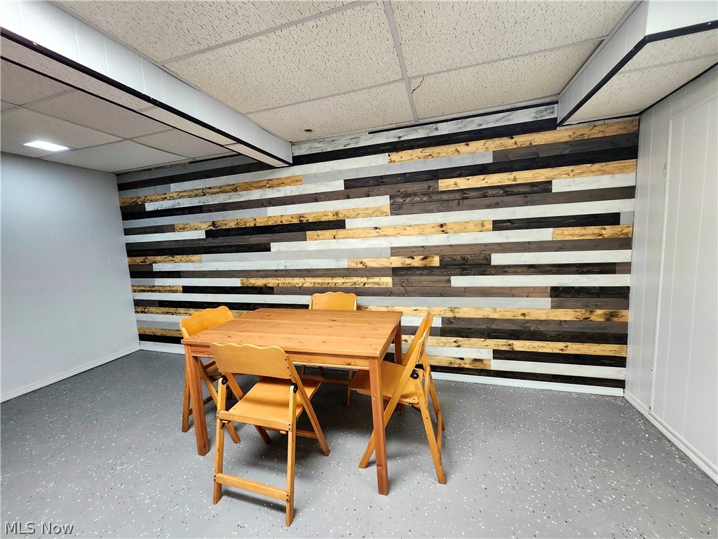 6488 State Road, Unit B 12 Cleveland, OH 44134 - Photo 31 of 46 Dining area featuring a drop ceiling