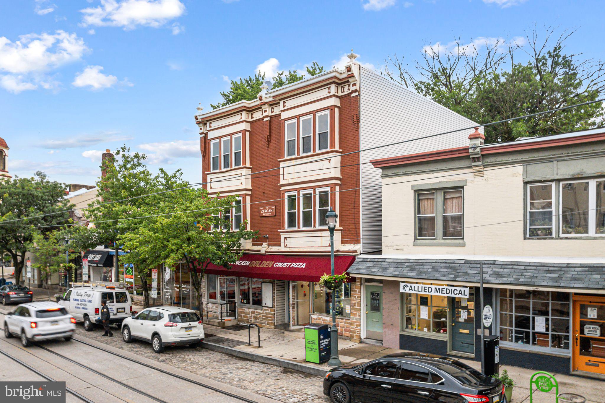 a view of a car park in front of a building