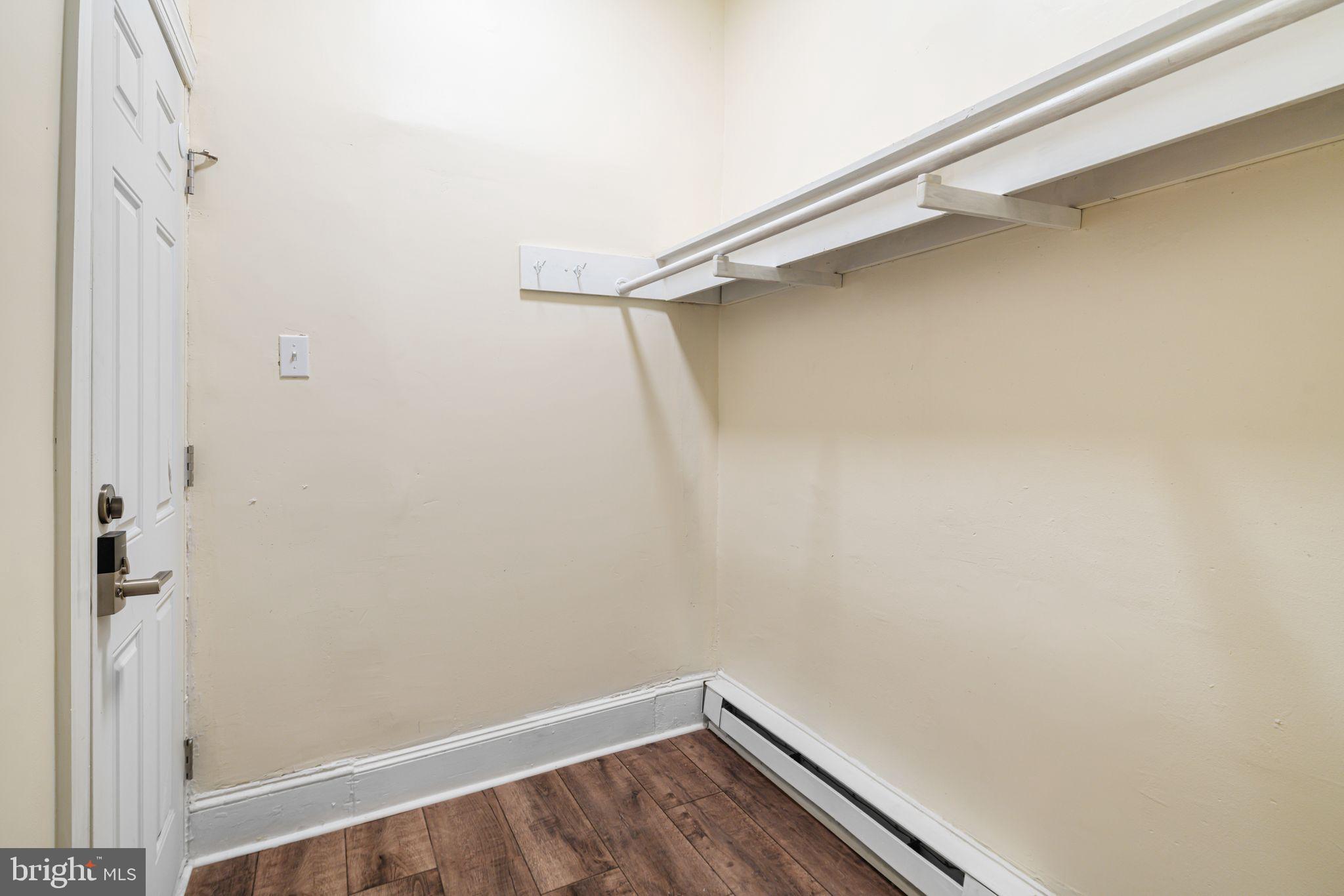 7153 Germantown Avenue, Unit 4 Philadelphia, PA 19119 - Photo 7 of 11 a view of a room with shelf