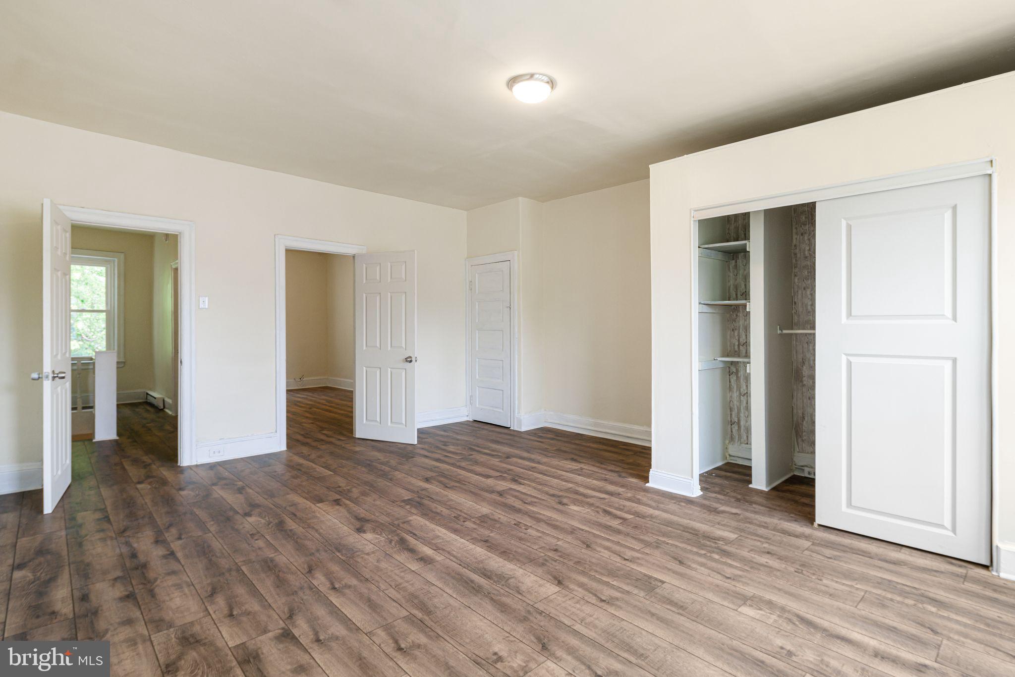 7153 Germantown Avenue, Unit 4 Philadelphia, PA 19119 - Photo 8 of 11 a view of empty room with wooden floor