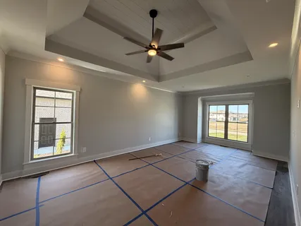 a view of an empty room with a window