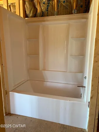 a bathroom with a bathtub