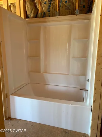 a bathroom with a bathtub