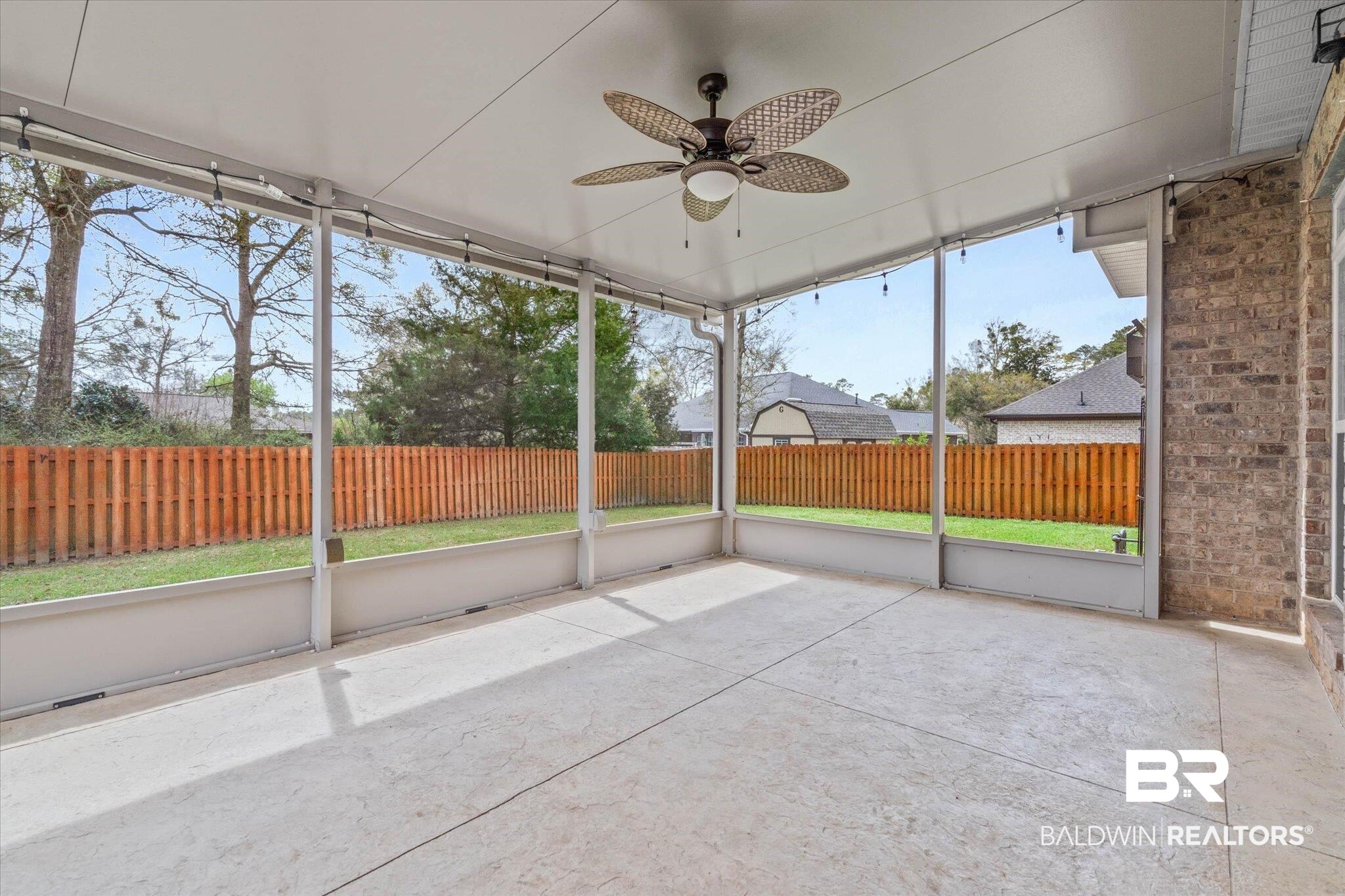 704 Edinburgh Avenue Foley, AL 36535 - Photo 28 of 32 Unfurnished sunroom with ceiling fan