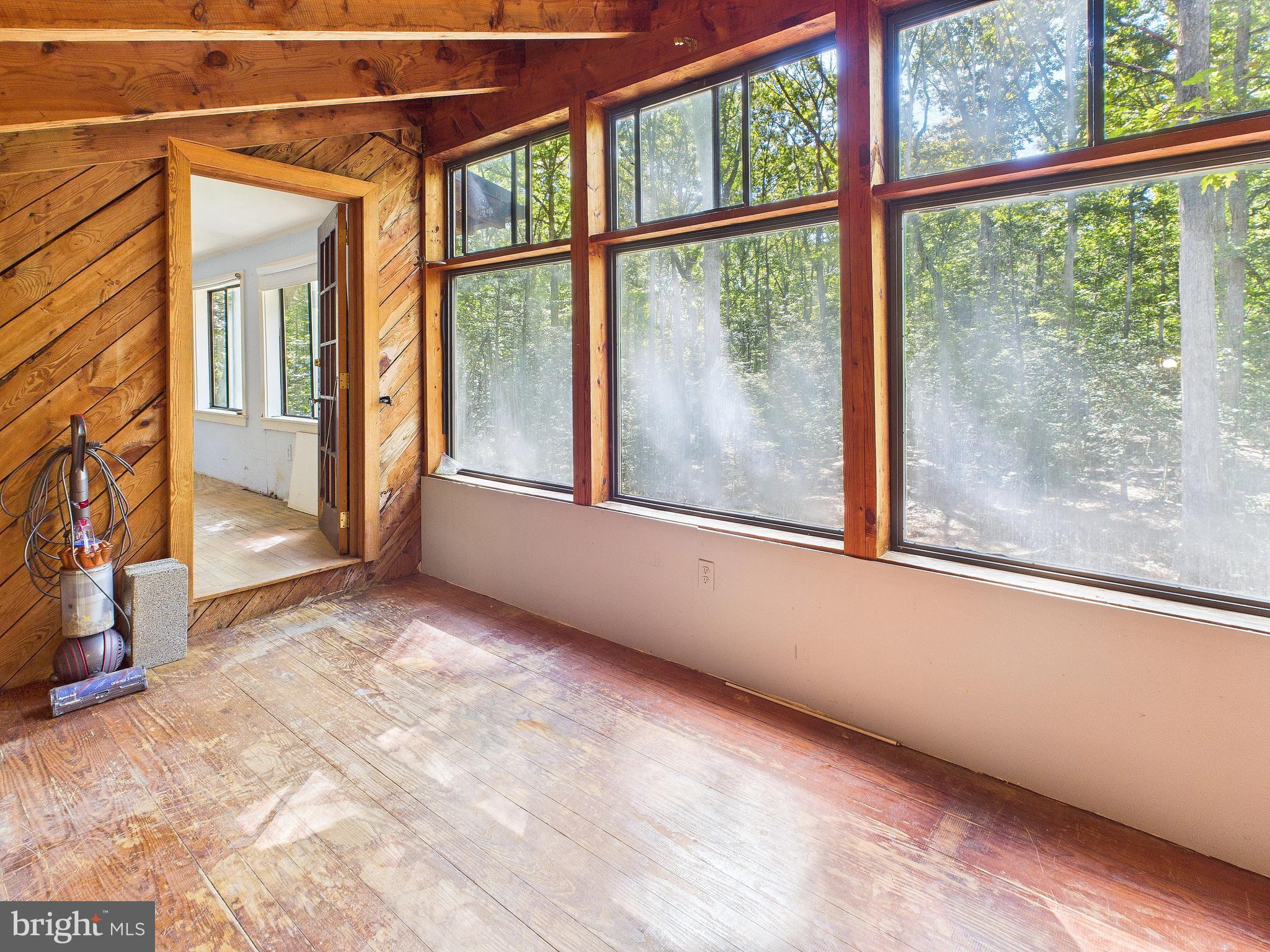 11330 Holly Springs Road Nanjemoy, MD 20662 - Photo 23 of 42 a view of an empty room with a window