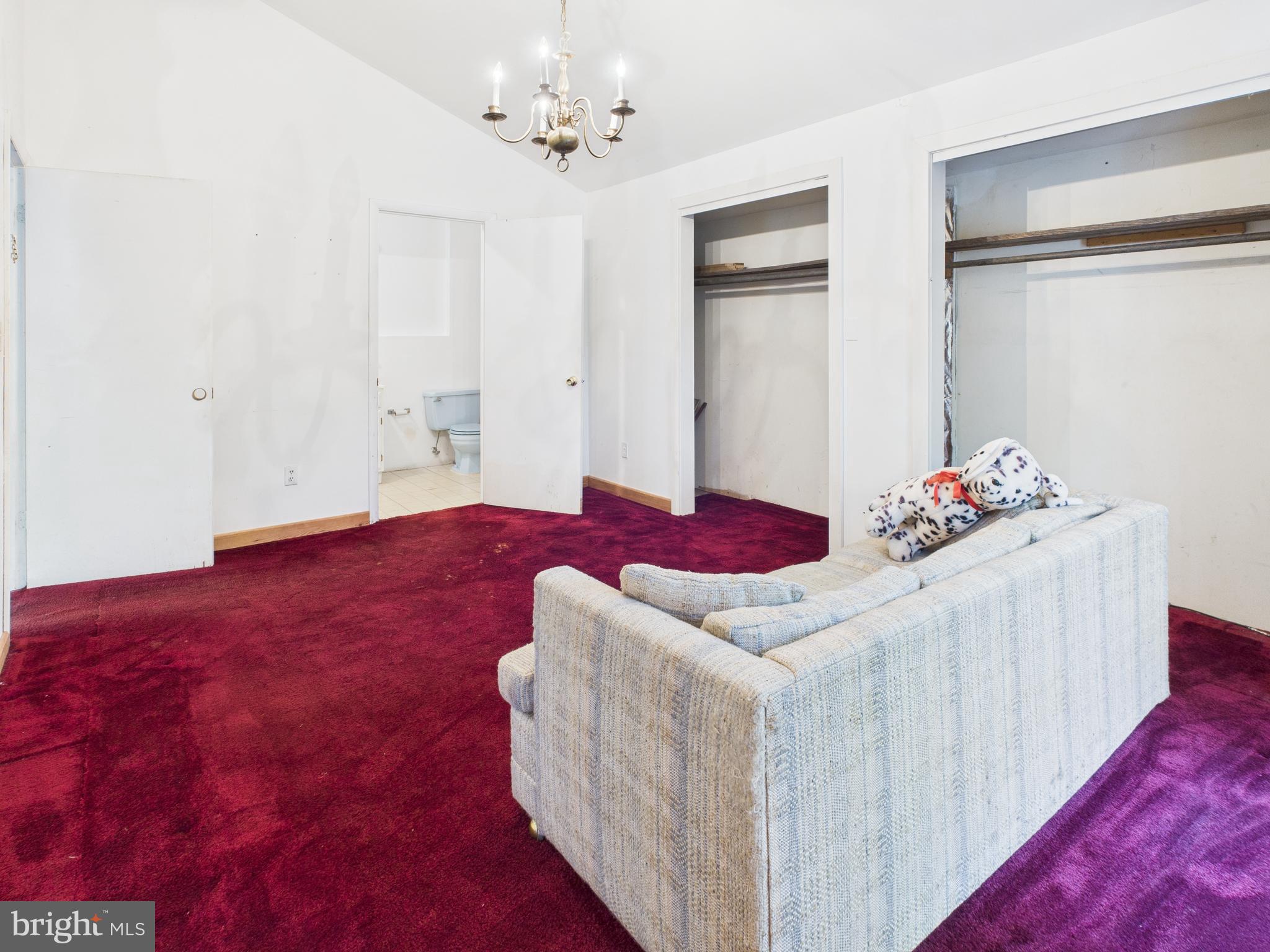 11330 Holly Springs Road Nanjemoy, MD 20662 - Photo 29 of 42 a living room with furniture and wooden floor