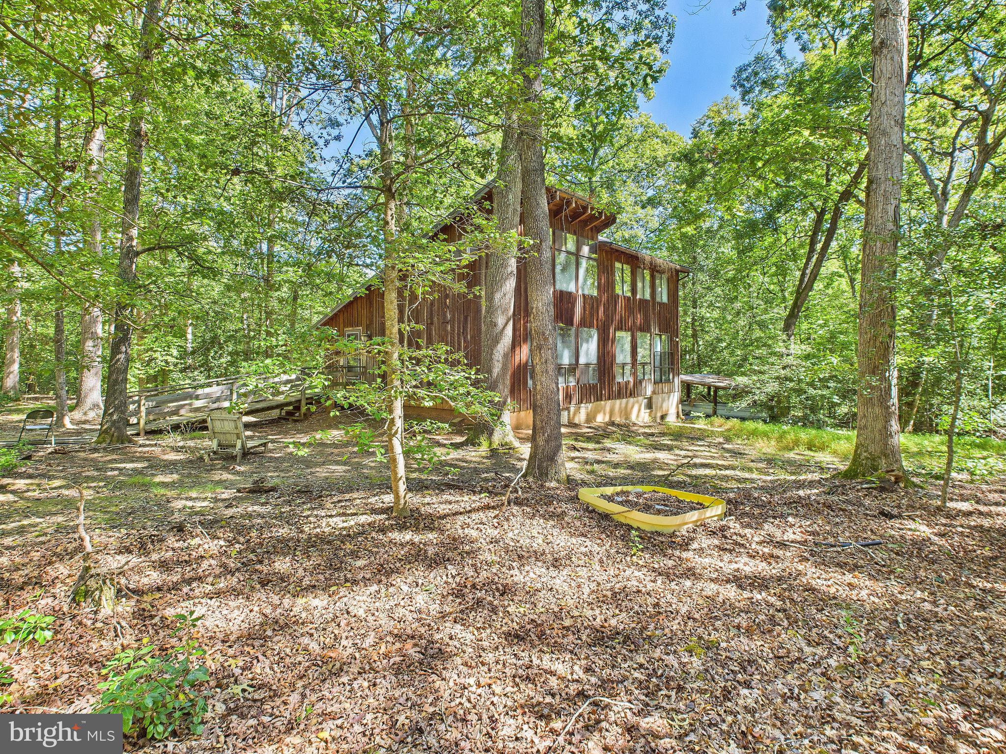 11330 Holly Springs Road Nanjemoy, MD 20662 - Photo 35 of 42 a view of a house with backyard and trees