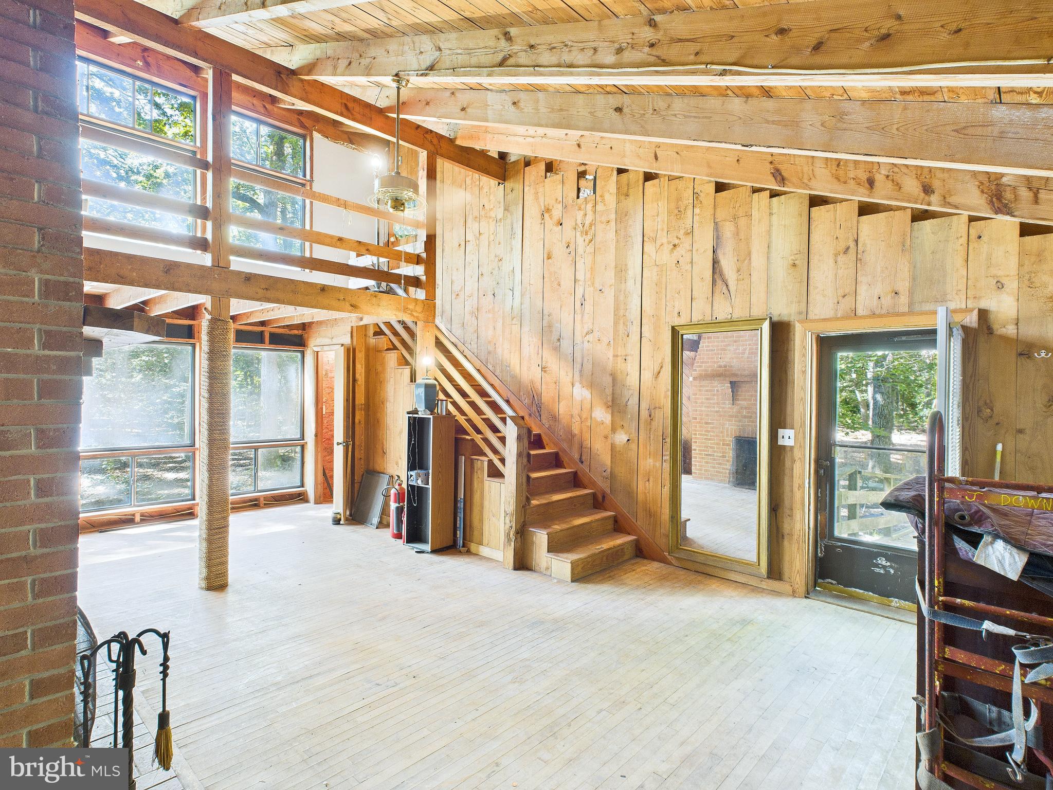 11330 Holly Springs Road Nanjemoy, MD 20662 - Photo 7 of 42 a view of an entryway with a floor to ceiling window