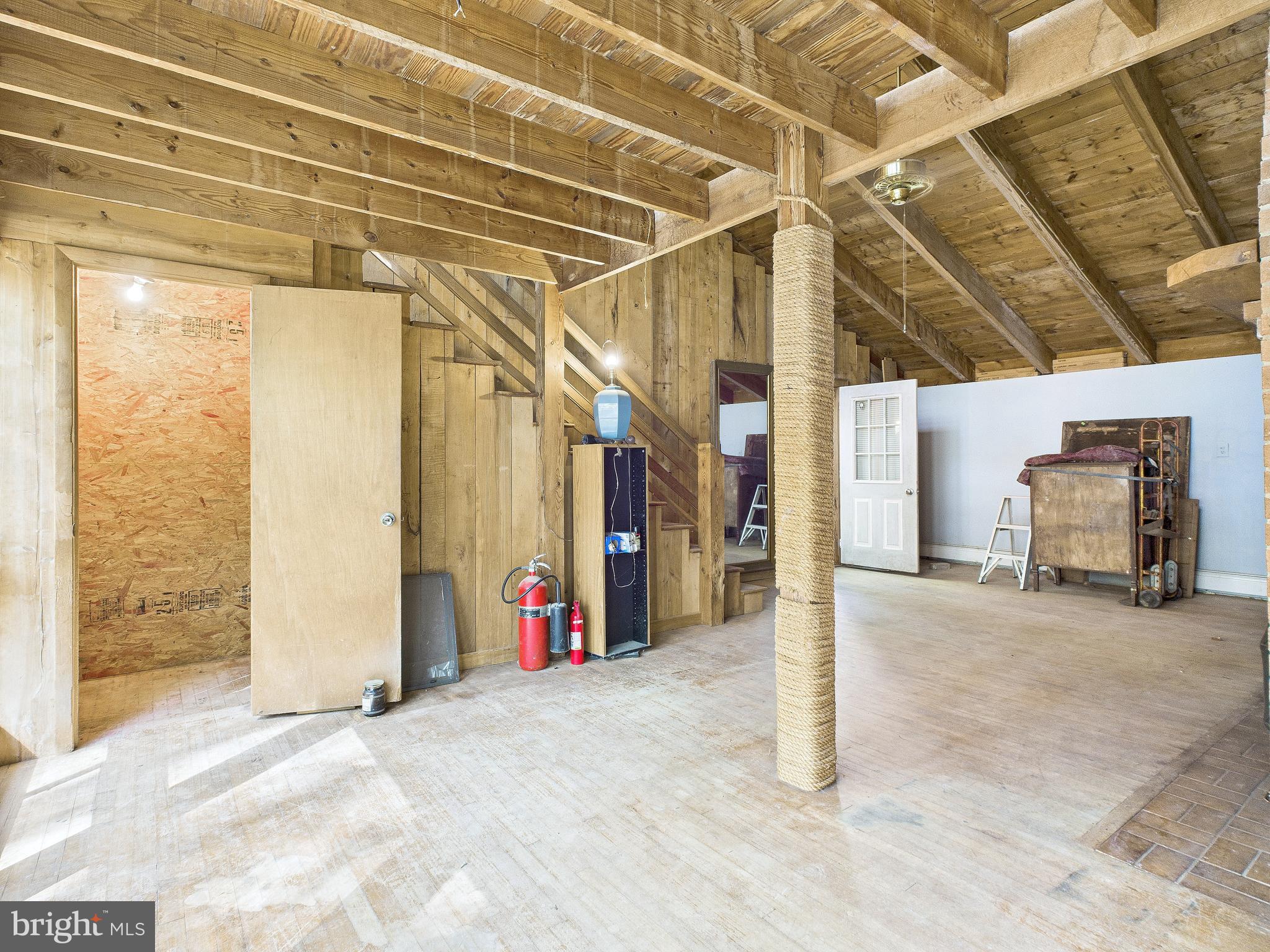 11330 Holly Springs Road Nanjemoy, MD 20662 - Photo 9 of 42 a view of a room with wooden walls