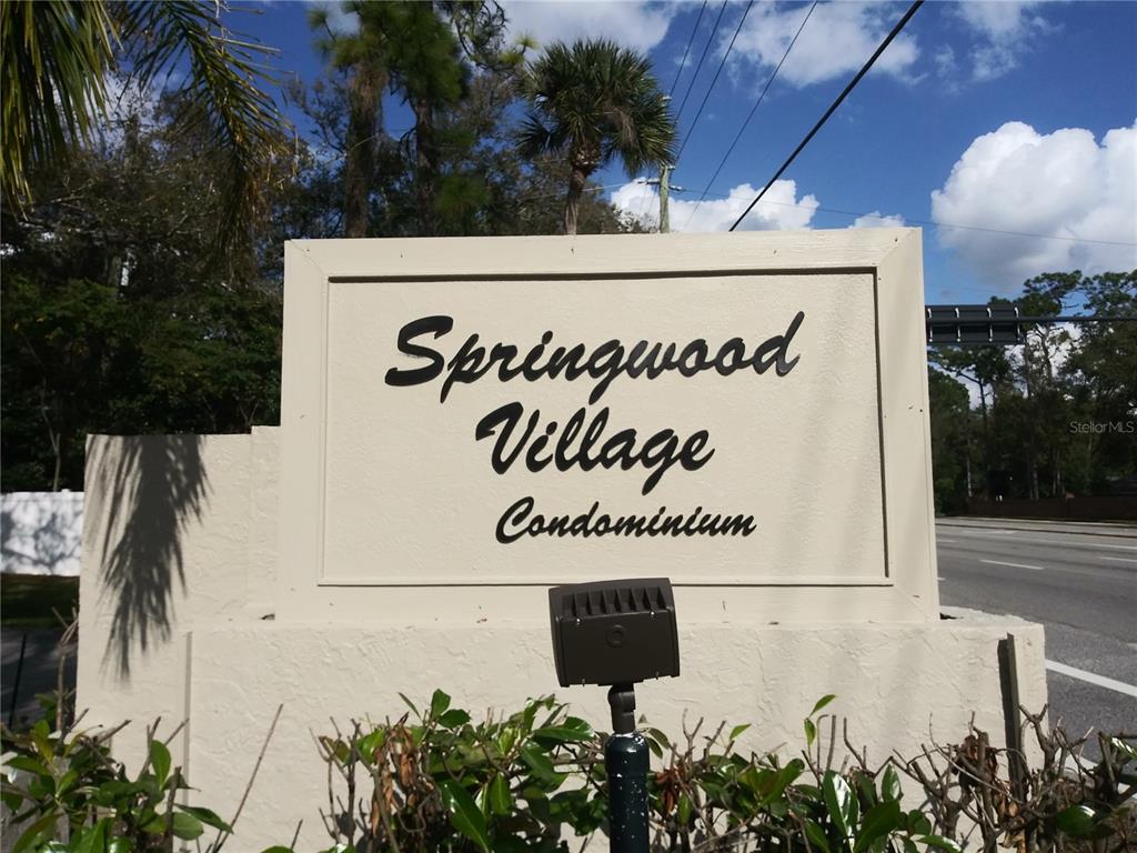 127 Springwood Circle, Unit H Longwood, FL 32750 - Photo 12 of 12 a sign on the side of a building