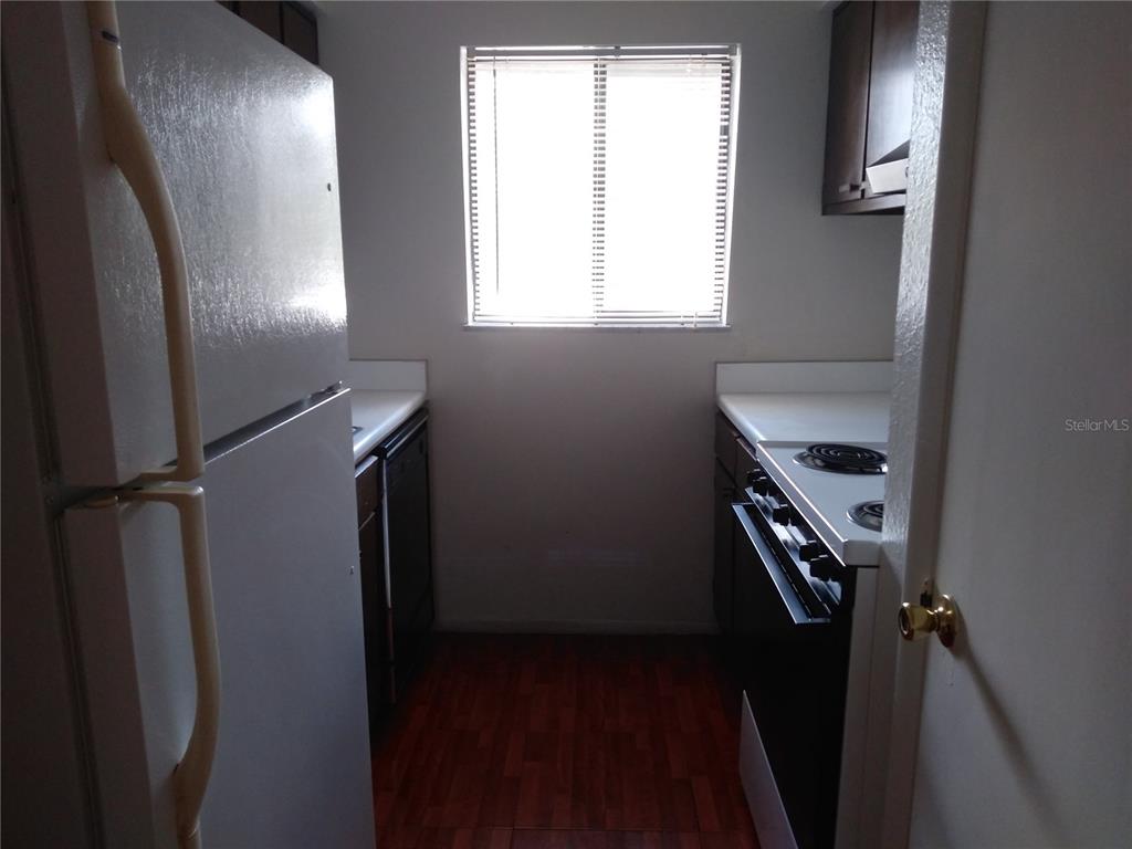 127 Springwood Circle, Unit H Longwood, FL 32750 - Photo 4 of 12 a room with windows and closet