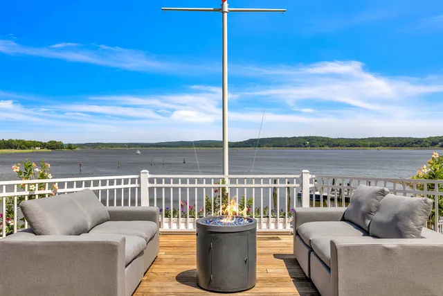 a balcony with furniture and city view