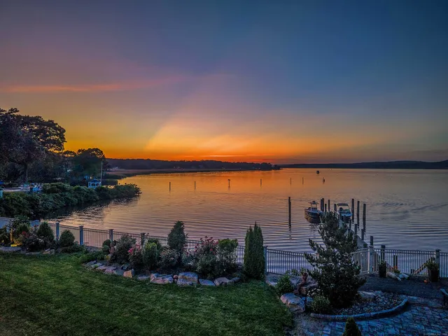 a view of a lake with a building in the background
