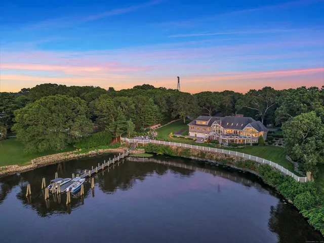 a view of a big building next to a yard