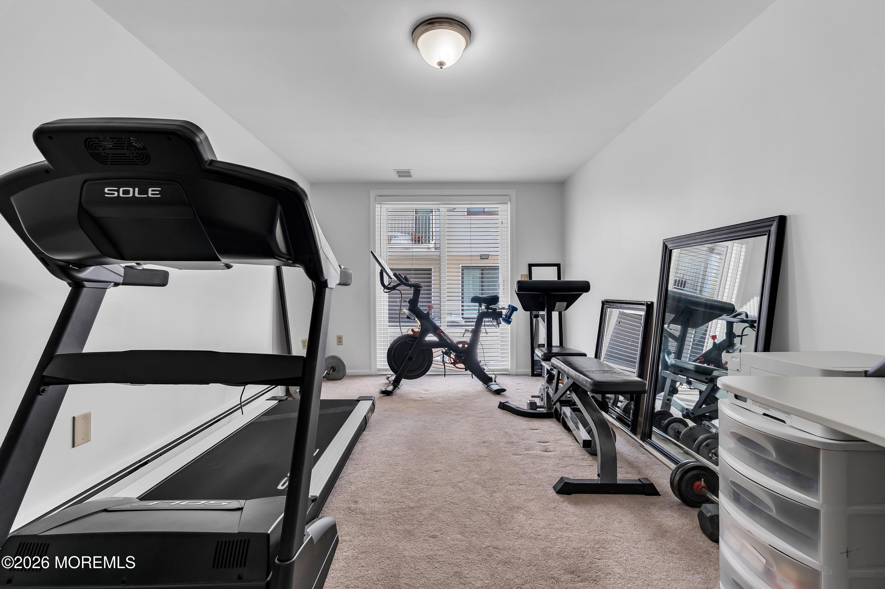 580 Patten Avenue, Unit 14 Long Branch, NJ 07740 - Photo 25 of 29 a view of a room with gym equipment