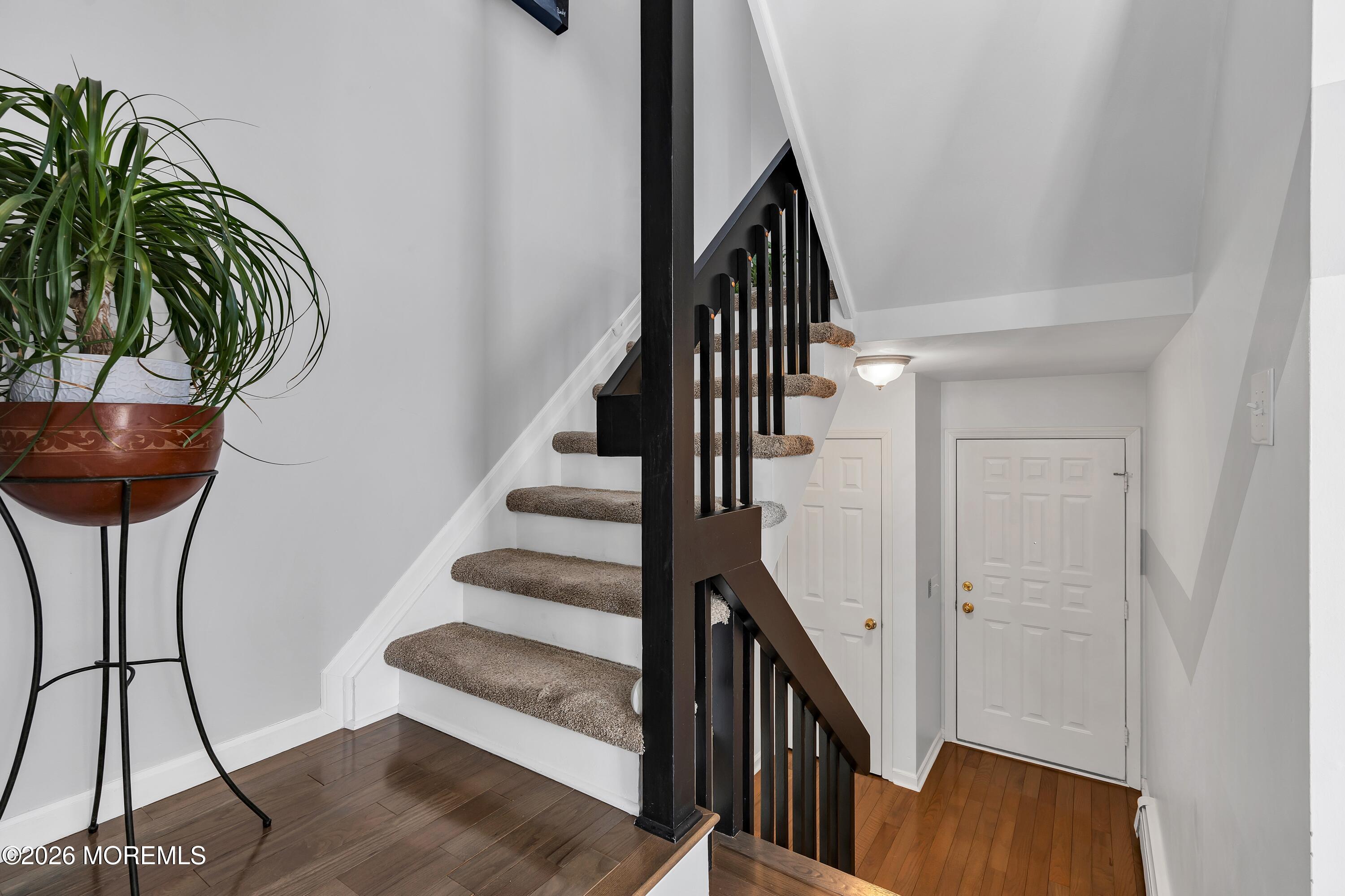 580 Patten Avenue, Unit 14 Long Branch, NJ 07740 - Photo 27 of 29 a view of entryway and hall with wooden floor