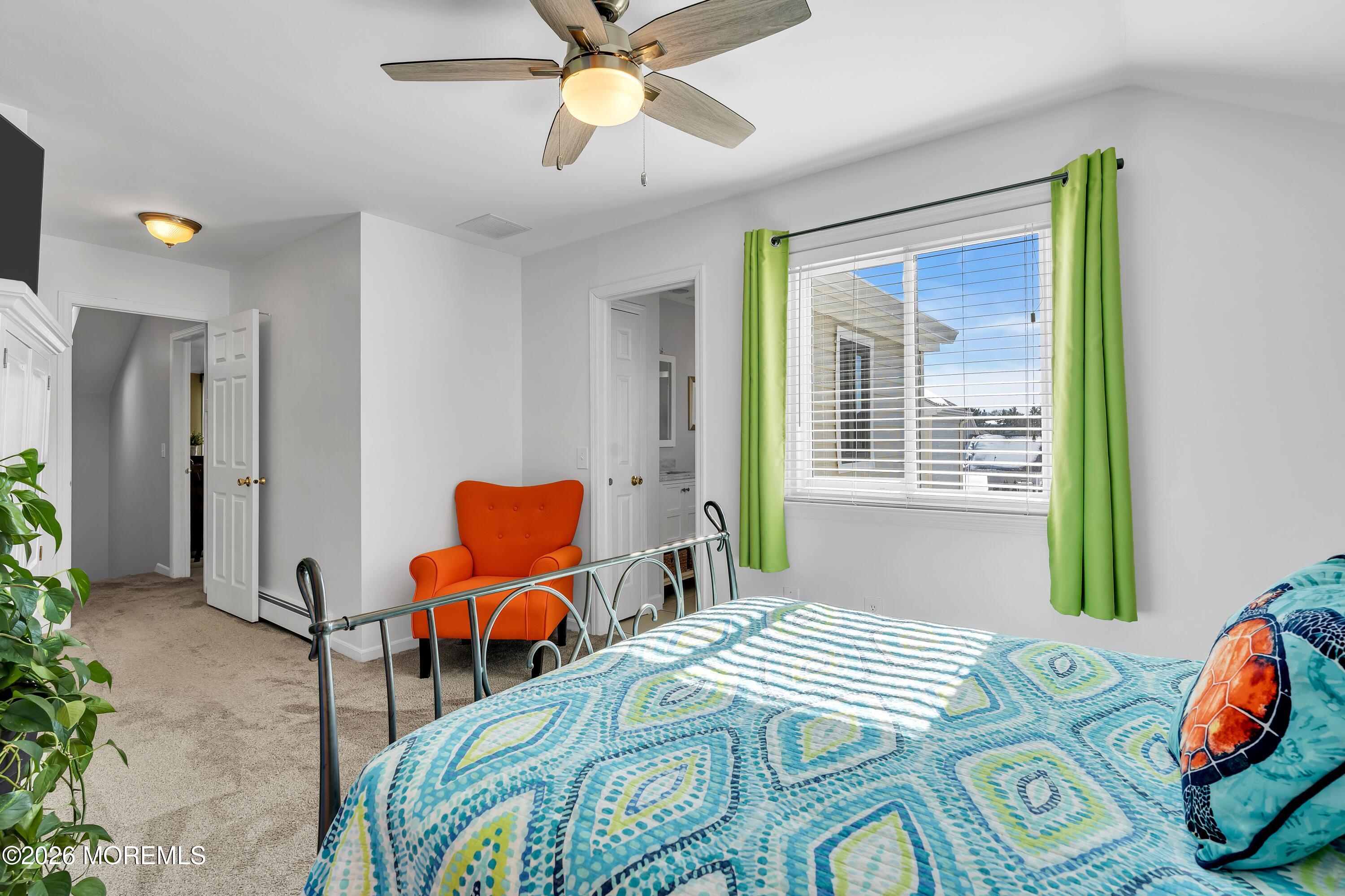 580 Patten Avenue, Unit 14 Long Branch, NJ 07740 - Photo 8 of 29 a bedroom with a bed and a window