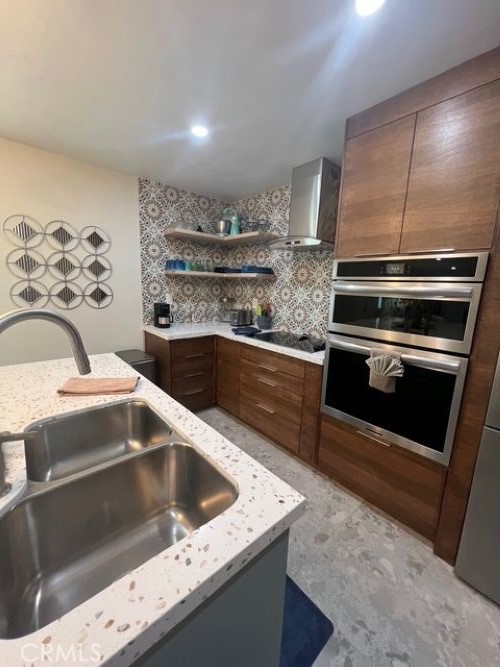 72724 Eagle Road, Unit 1 Palm Desert, CA 92260 - Photo 8 of 30 a kitchen with a stove and a sink