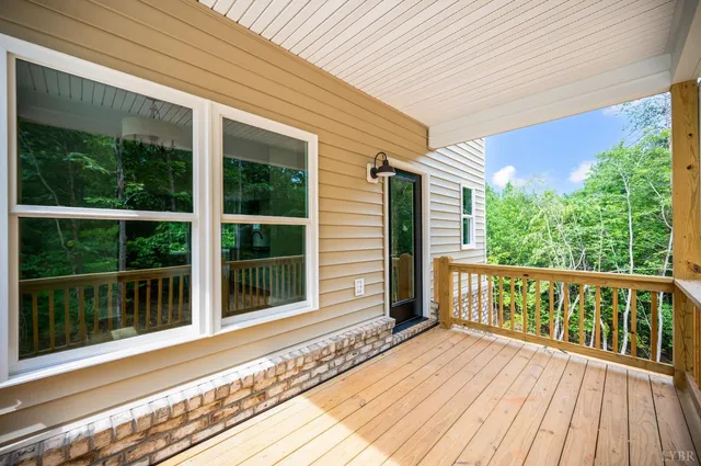 a view of a two chairs on the roof deck