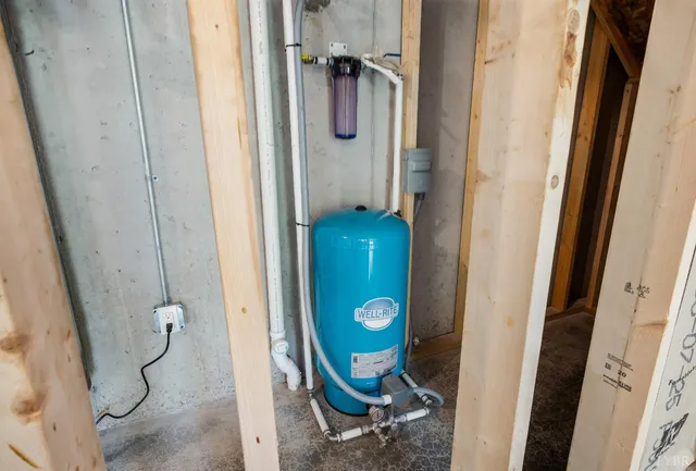 a view of an house with backyard space and garden